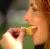 Woman eating fruit for health